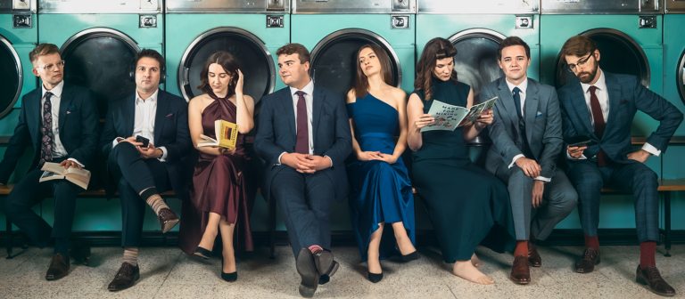 Adults in a laundry mat